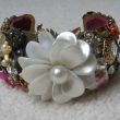 Verkocht Armband Collage Witte Bloem € 70,00